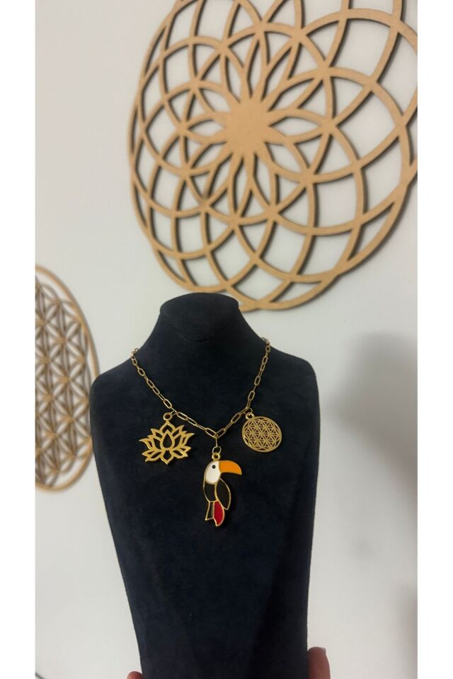 Çelik tukan kuşu yaşam çiçeği lotus çiçeği kolye